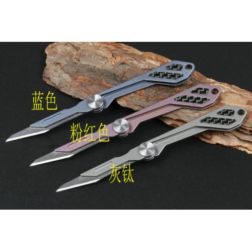 Titanium handle jj068 carving folding knife (three colors) blue deficiency