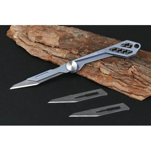 Titanium handle jj068 carving folding knife (three colors) blue deficiency