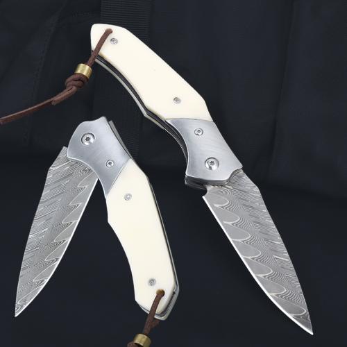 Damascus bone handle folding knife