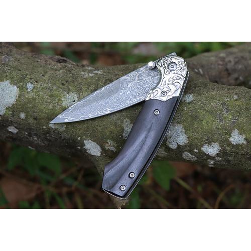 Steel patterned black fox Damascus folding knife