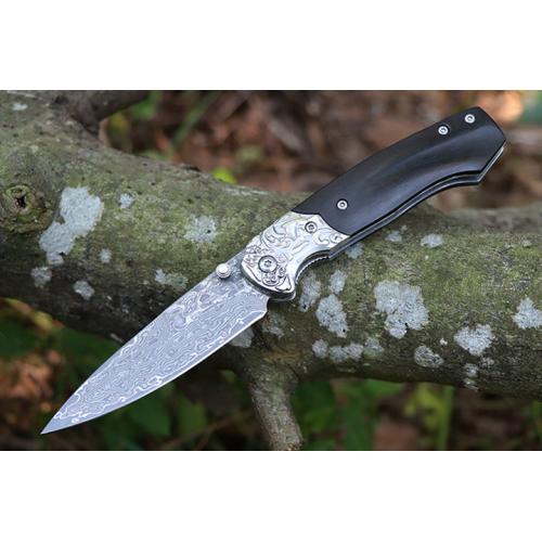 Steel patterned black fox Damascus folding knife